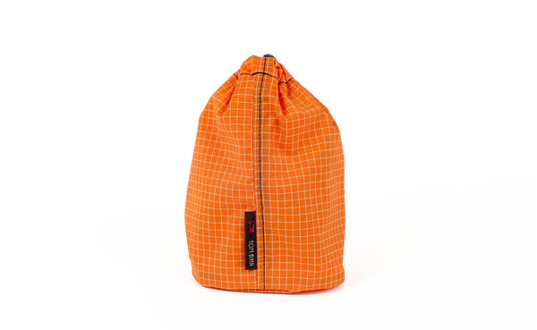 A Size 2 Zest (pale orange with white grid) 200 Halcyon Travel Stuff Sack.